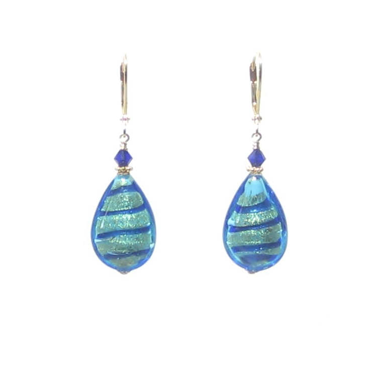a pair of earrings with a blue glass drop