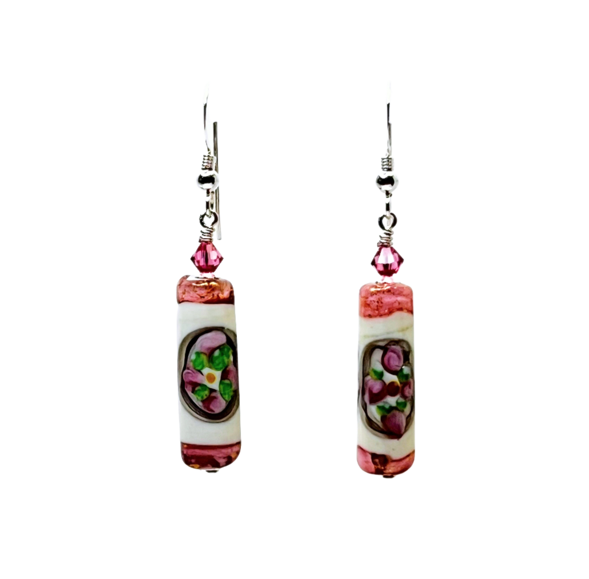 a pair of pink and green glass earrings