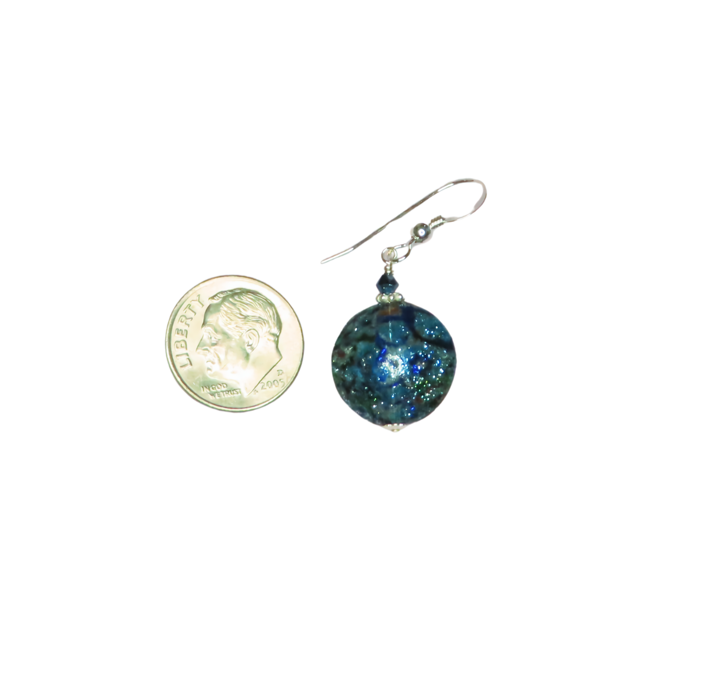 a pair of earrings with a coin hanging from it