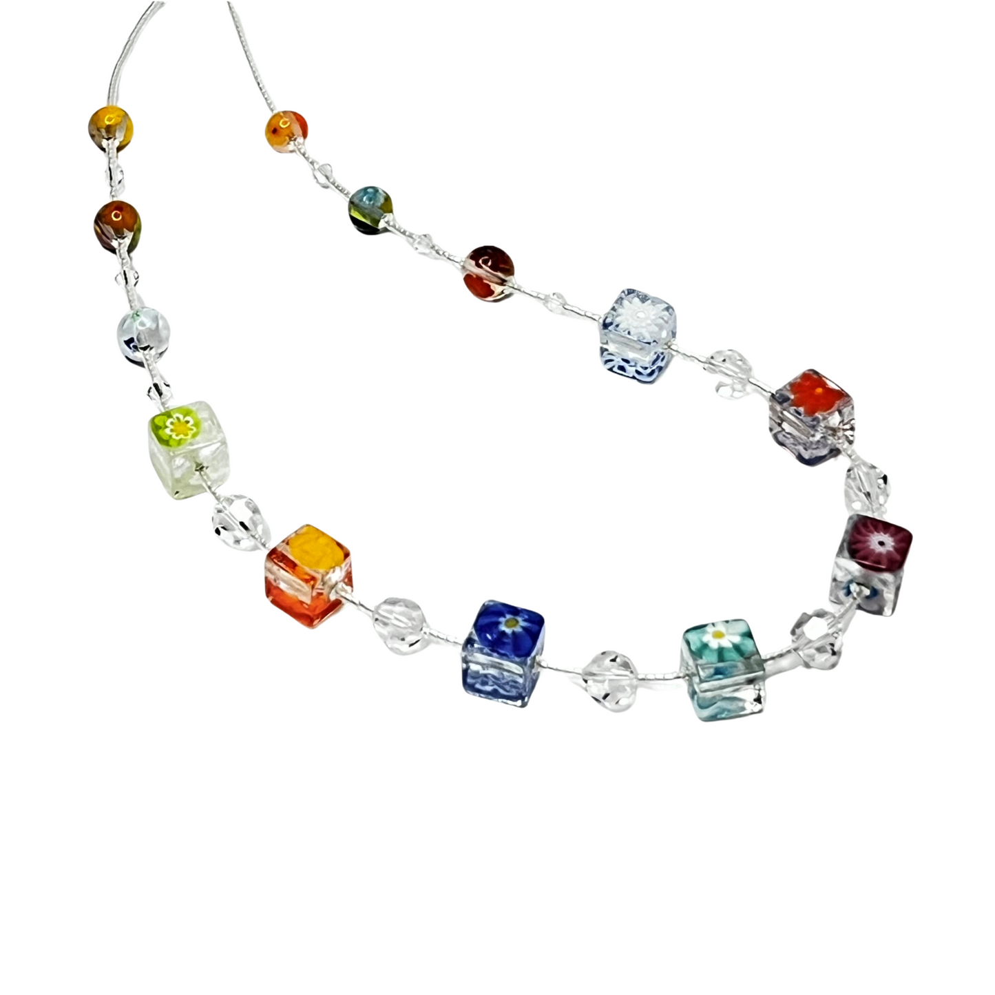 a multicolored glass beaded necklace on a white background