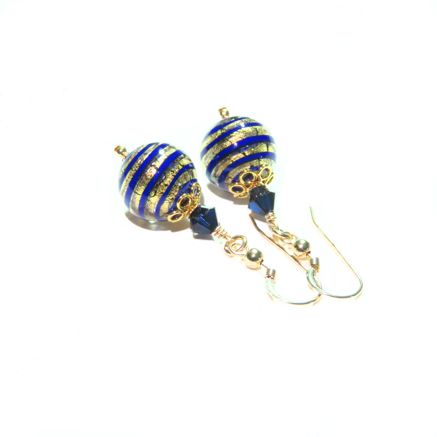 a pair of blue and gold striped earrings
