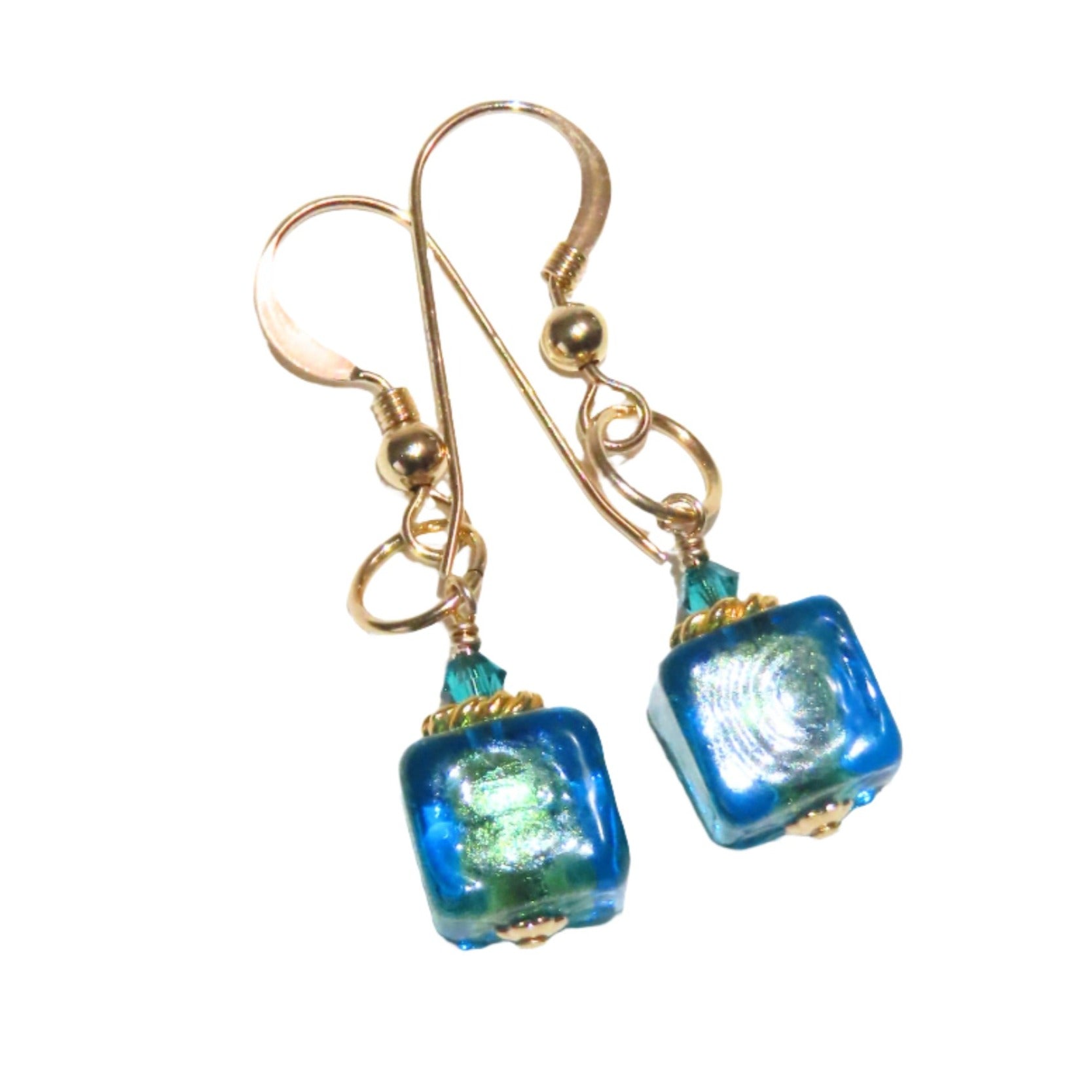 a pair of blue and green glass earrings