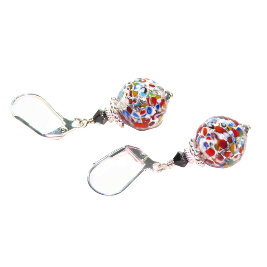 a pair of earrings with colorful beads on them