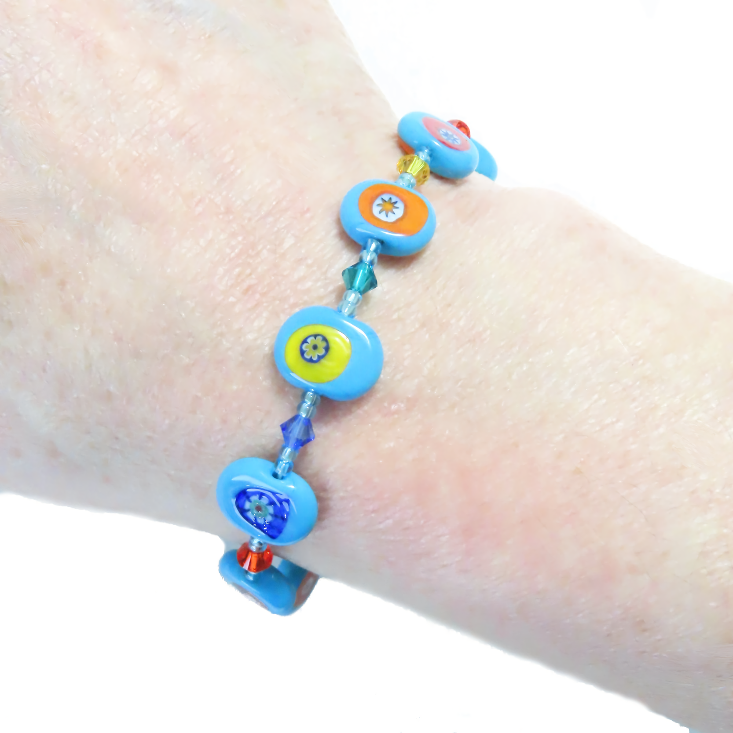 Murano glass turquoise millefiori bracelet on wrist